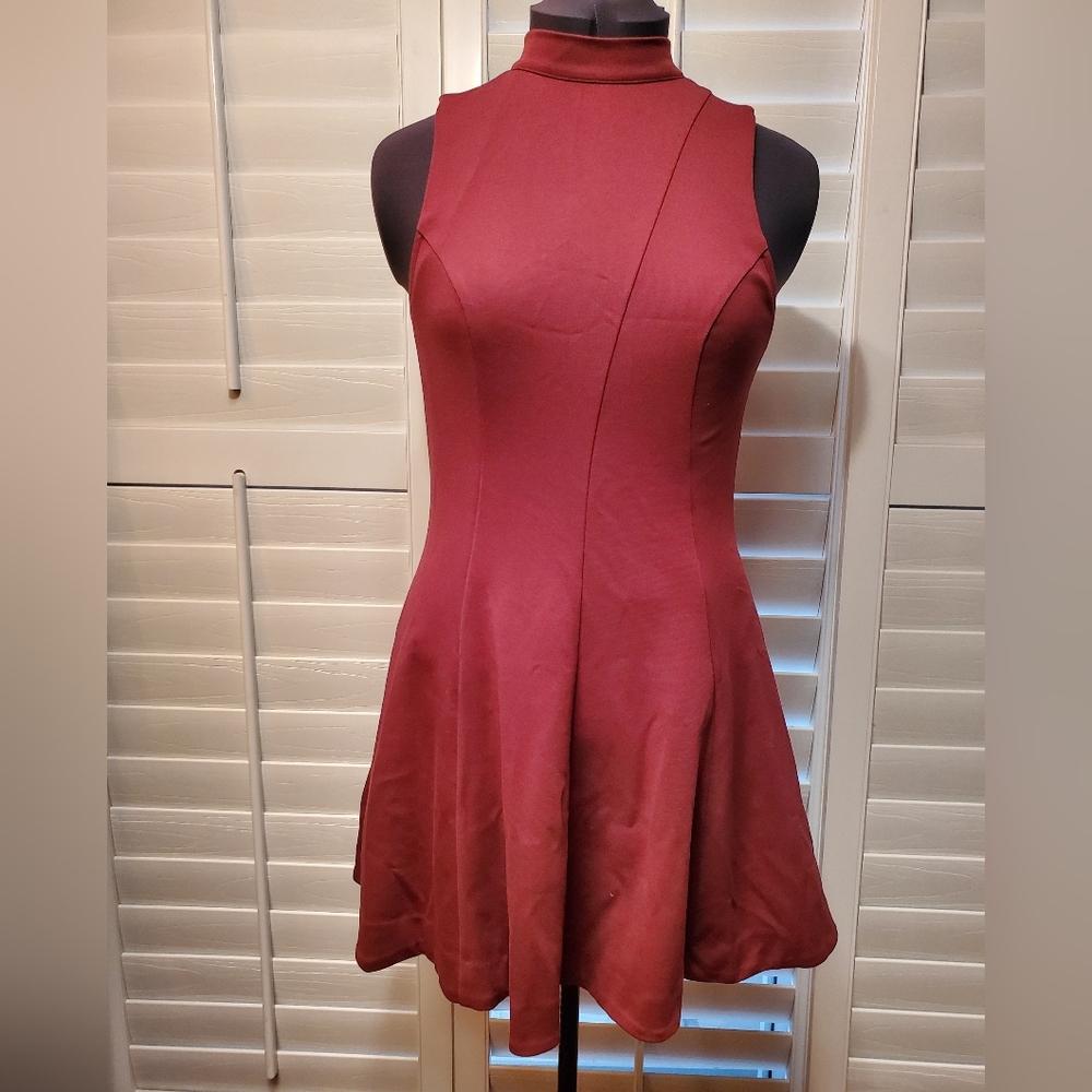 Free People burgundy/maroon asymmetrical fit and flare dress.  Size M
